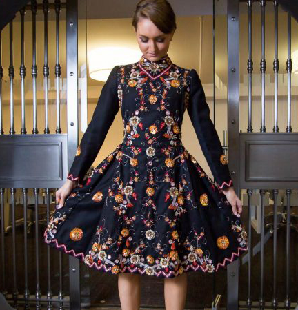 A Scarlet Poppy Arte garment displayed for fundraising.