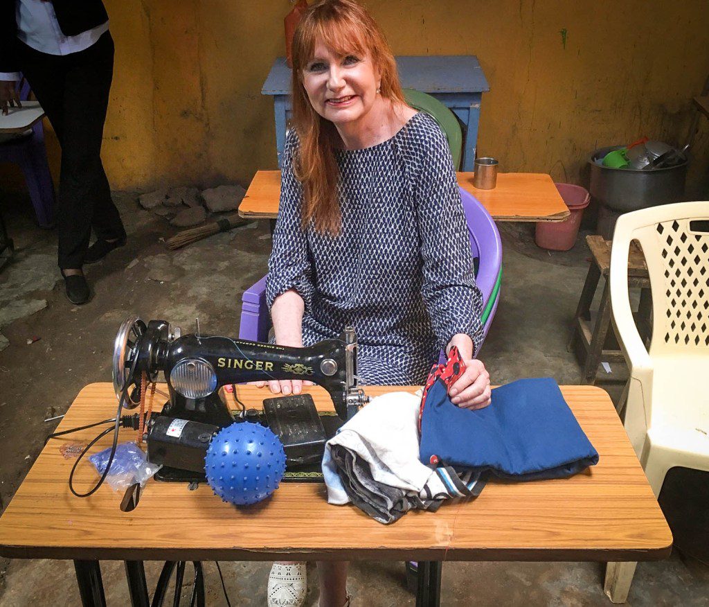 Women gathered for a community program in Congo.